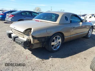 2005 Ford Thunderbird Deluxe with VIN 1FAHP60A45Y100899, listed as a IAAI auction lot 41803706 with 75,319 mi miles. Bid and sale history available at carsss.com. Image 4.