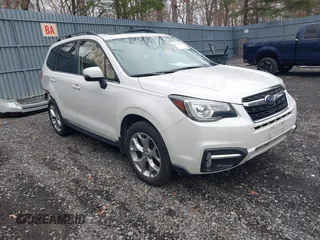 2018 Subaru Forester Touring with VIN JF2SJAWC7JH472147, listed as a IAAI auction lot 41723135 with 63,824 mi miles and . Bid and sale history available at DreamBid. Image 1.