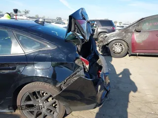 2022 Honda Civic Sport z VIN 2HGFE2F50NH568764, wystawiony jako IAAI lot #41867230 z przebiegiem 102 167 mil mil oraz . Historia ofert i sprzedaży dostępna na DreamBid. Obrazek 6.