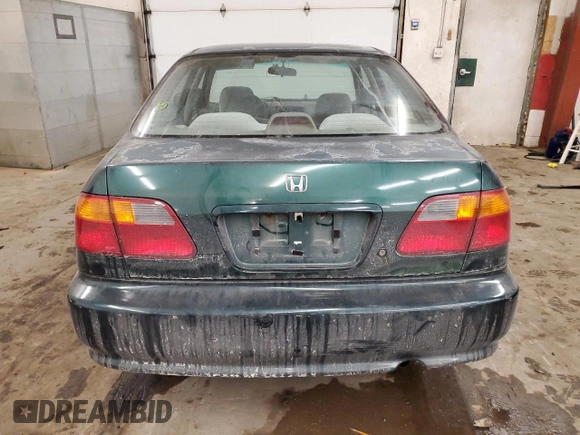 1999 Honda Civic VP z VIN 2HGEJ6611XH594868, wystawiony jako Copart lot #45193835 z przebiegiem 180 914 mil mil oraz Szkoda całkowita • Salvage title. Historia ofert i sprzedaży dostępna na DreamBid. Obrazek 6.