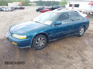 1994 Honda Accord LX with VIN 1HGCD5635RA157273, listed as a IAAI auction lot 41909466 with 196,202 mi miles. Bid and sale history available at carsss.com. Image 2.