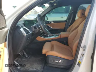 2024 BMW X5 xDrive40i z VIN 5UX23EU02R9T40376, wystawiony jako Copart lot #53941995 z przebiegiem 40 390 mil mil oraz Szkoda całkowita • Salvage title. Historia ofert i sprzedaży dostępna na DreamBid. Obrazek 7.