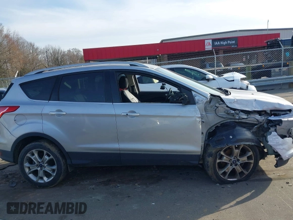 2014 Ford Escape Titanium with VIN 1FMCU0JX3EUB22005, listed as a IAAI auction lot 41610799 with 248,066 mi miles. Bid and sale history available at carsss.com. Image 13.