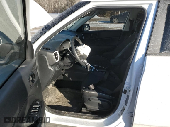 2024 Hyundai Venue SEL with VIN KMHRC8A39RU290214, listed as a Copart auction lot 82413604 with 52,988 mi miles and Salvage Title. Bid and sale history available at DreamBid. Image 7.