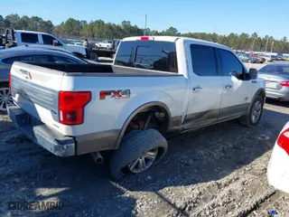 2018 Ford F-150 XL with VIN 1FTEW1EG7JFC09489, listed as a IAAI auction lot 41346016 with 129,436 mi miles. Bid and sale history available at carsss.com. Image 4.