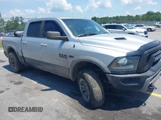 2015 Ram 1500 Rebel with VIN 1C6RR7YT4FS785518, listed as a IAAI auction lot 42553985 with 137,743 mi miles and . Bid and sale history available at DreamBid. Image 1.