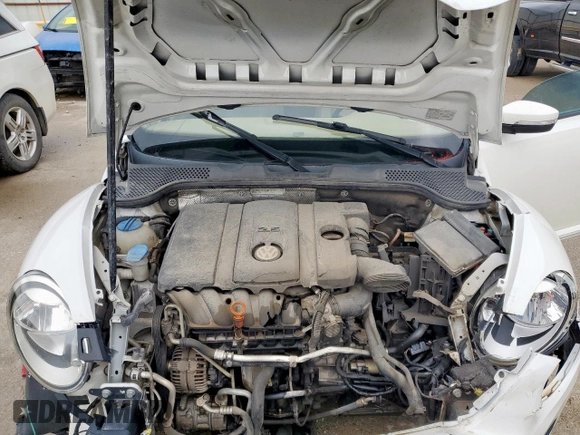 2013 Volkswagen Beetle 2.5L w/Sun/Sound/Nav with VIN 3VWJX7ATXDM610778, listed as a Copart auction lot 55654045 with Not Provided miles and Salvage Title. Bid and sale history available at DreamBid. Image 11.