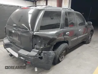 2005 Chevrolet TrailBlazer LS with VIN 1GNDS13SX52183540, listed as a IAAI auction lot 42074299 with 137,473 mi miles and . Bid and sale history available at DreamBid. Image 4.