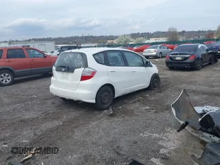 2013 Honda Fit with VIN JHMGE8H36DC022455, listed as a IAAI auction lot 41955605 with 172,471 mi miles. Bid and sale history available at carsss.com. Image 4.