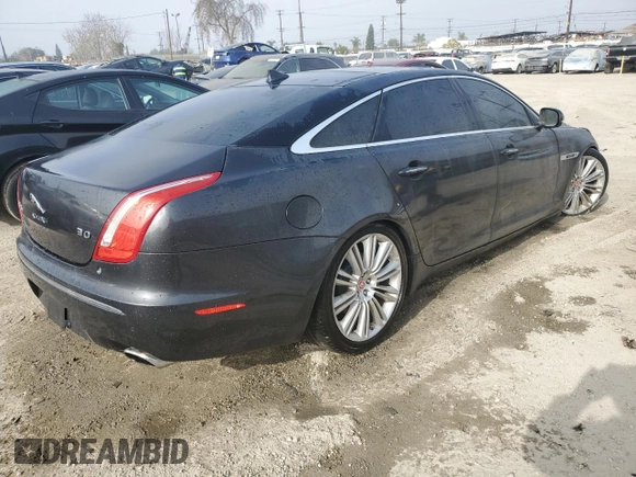 2015 Jaguar XJ with VIN SAJWA2GZ3F8V83991, listed as a Copart auction lot 87122824 with 0 mi miles and Non Repairable. Bid and sale history available at carsss.com. Image 3.