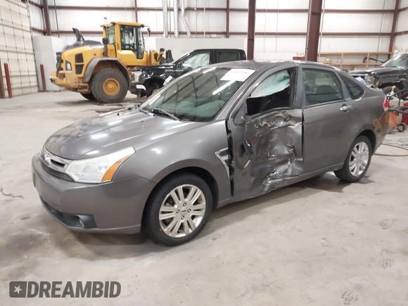 2009 Ford Focus SEL with VIN 1FAHP37N39W253086, listed as a IAAI auction lot 41825983 with 158,720 mi miles. Bid and sale history available at carsss.com. Image 2.