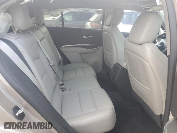2022 Cadillac XT4 FWD Luxury with VIN 1GYAZAR4XNF121008, listed as a Copart auction lot 77599974 with 29,141 mi miles and Salvage title. Bid and sale history available at DreamBid. Image 11.
