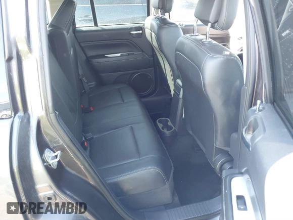 2017 Jeep Compass Latitude with VIN 1C4NJDEB0HD190200, listed as a IAAI auction lot 41733462 with 77,374 mi miles and . Bid and sale history available at DreamBid. Image 8.