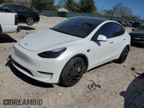 2021 Tesla Model Y Performance with VIN 5YJYGDEF7MF269221, listed as a Copart auction lot 52109785 with 61,619 mi miles and Salvage Title. Bid and sale history available at DreamBid. Image 1.