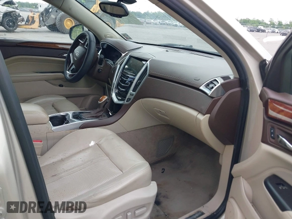 2014 Cadillac SRX Performance Collection z VIN 3GYFNCE35ES610504, wystawiony jako IAAI lot #42133548 z przebiegiem 140 306 mil mil oraz . Historia ofert i sprzedaży dostępna na DreamBid. Obrazek 5.