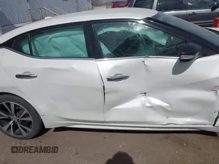 2018 Nissan Maxima SL z VIN 1N4AA6AP6JC366308, wystawiony jako IAAI lot #41823787 z przebiegiem 94 020 mil mil oraz . Historia ofert i sprzedaży dostępna na DreamBid. Obrazek 13.