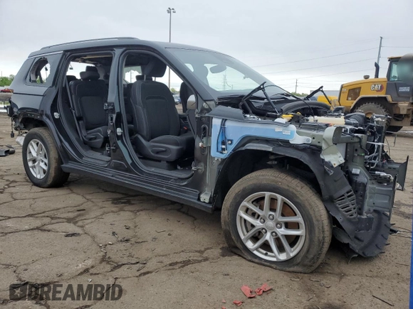2023 Jeep Grand Cherokee Altitude with VIN 1C4RJKAGXP8886822, listed as a Copart auction lot 57200425 with Not provided miles and Salvage title. Bid and sale history available at DreamBid. Image 4.