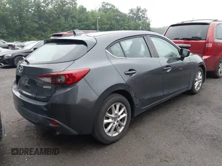 2015 Mazda 3 i Grand Touring with VIN 3MZBM1M72FM228899, listed as a IAAI auction lot 42612074 with 149,226 mi miles and . Bid and sale history available at DreamBid. Image 4.