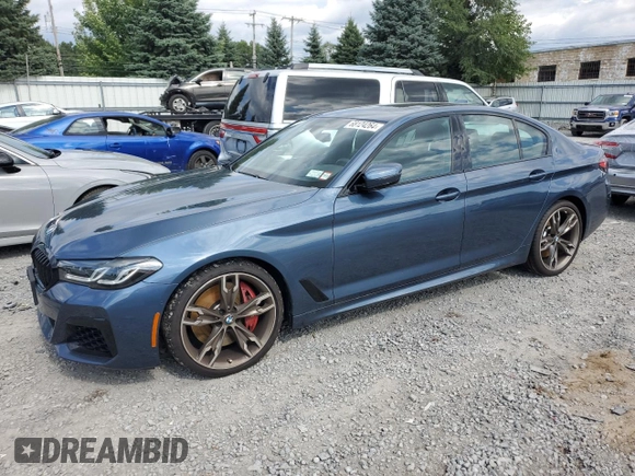 2023 BMW 5 Series M550i xDrive z VIN WBA13BK02PCN82953, wystawiony jako Copart lot #68124264 z przebiegiem 10 010 mil mil oraz Szkoda całkowita • Salvage title. Historia ofert i sprzedaży dostępna na DreamBid. Obrazek 1.