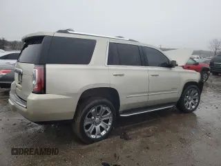 2015 GMC Yukon Denali with VIN 1GKS2CKJ3FR592707, listed as a Copart auction lot 47581575 with 121,326 mi miles and Salvage Title. Bid and sale history available at carsss.com. Image 3.