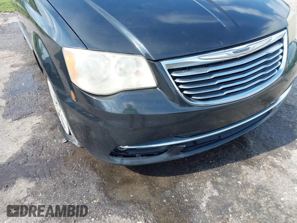 2013 Chrysler Town & Country Touring z VIN 2C4RC1BG5DR742792, wystawiony jako IAAI lot #42005481 z przebiegiem 204 002 mil mil oraz . Historia ofert i sprzedaży dostępna na DreamBid. Obrazek 6.