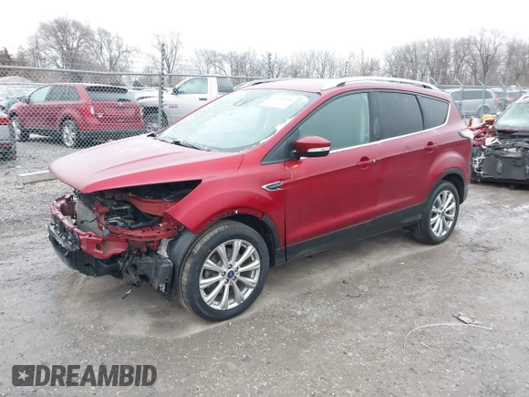 2017 Ford Escape Titanium with VIN 1FMCU9J95HUA48807, listed as a IAAI auction lot 41522636 with 218,342 mi miles. Bid and sale history available at carsss.com. Image 21.