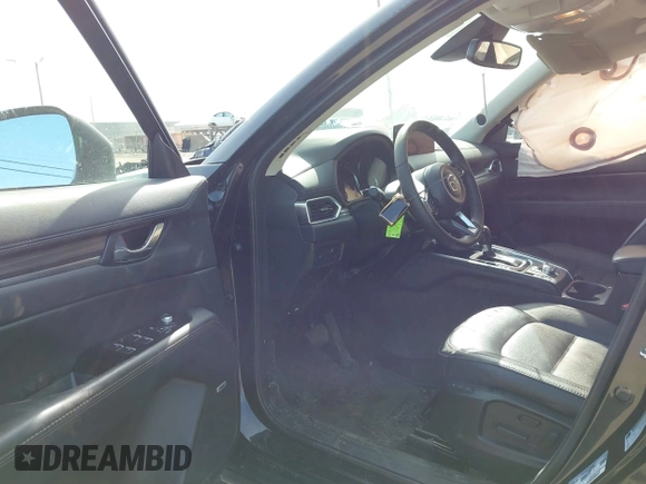 2023 Mazda CX-5 S Premium with VIN JM3KFBDM7P0201038, listed as a IAAI auction lot 41772989 with 26,227 mi miles and . Bid and sale history available at DreamBid. Image 5.
