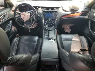 2014 Cadillac CTS Luxury AWD with VIN 1G6AX5SX5E0129143, listed as a Copart auction lot 58914015 with 131,465 mi miles and Salvage title. Bid and sale history available at DreamBid. Image 8.