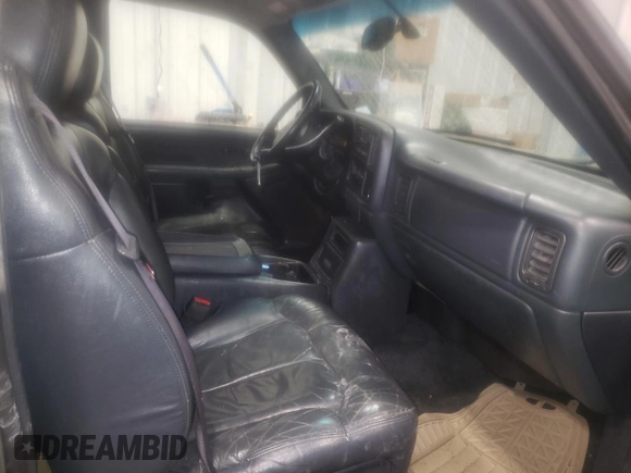 1999 GMC New Sierra 1500 SLE with VIN 2GTEK19T0X1569819, listed as a Copart auction lot 61018334 with 198,180 mi miles and Non Repairable. Bid and sale history available at carsss.com. Image 7.
