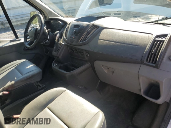 2018 Ford Transit z VIN 1FTYR2CM1JKB39451, wystawiony jako Copart lot #70852124 z przebiegiem 230 942 mil mil oraz Tytuł czysty. Historia ofert i sprzedaży dostępna na DreamBid. Obrazek 8.