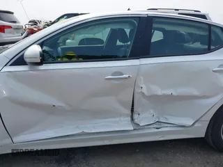 2015 Kia Optima LX z VIN KNAGM4A72F5627037, wystawiony jako IAAI lot #42399339 z przebiegiem 149 612 mil mil oraz . Historia ofert i sprzedaży dostępna na DreamBid. Obrazek 6.