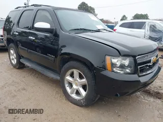 2014 Chevrolet Tahoe LT z VIN 1GNSCBE04ER143872, wystawiony jako IAAI lot #41377204 z przebiegiem 119 533 mil mil oraz . Historia ofert i sprzedaży dostępna na DreamBid. Obrazek 1.