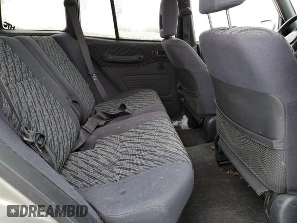 2000 Toyota RAV4 z VIN JT3HP10V9Y7166931, wystawiony jako Copart lot #83844934 z przebiegiem Nie podano mil oraz Czysty tytuł • Clean title. Historia ofert i sprzedaży dostępna na DreamBid. Obrazek 11.