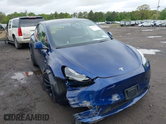 2024 Tesla Model Y Performance z VIN 7SAYGDEF1RA265382, wystawiony jako IAAI lot #42308468 z przebiegiem 9 700 mil mil oraz . Historia ofert i sprzedaży dostępna na DreamBid. Obrazek 6.
