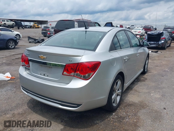 2014 Chevrolet Cruze 2LT z VIN 1G1PE5SB6E7270997, wystawiony jako IAAI lot #42323955 z przebiegiem 146 752 mil mil oraz . Historia ofert i sprzedaży dostępna na DreamBid. Obrazek 4.