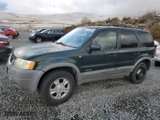 2002 Ford Escape Limited with VIN 1FMCU04182KD33151, listed as a Copart auction lot 81114584 with 137,008 mi miles and Salvage Title. Bid and sale history available at carsss.com. Image 1.