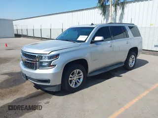 2015 Chevrolet Tahoe LT z VIN 1GNSCBKC2FR145619, wystawiony jako IAAI lot #42630761 z przebiegiem 138 287 mil mil oraz . Historia ofert i sprzedaży dostępna na DreamBid. Obrazek 2.