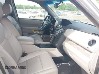 2015 Honda Pilot EX-L with VIN 5FNYF4H5XFB014653, listed as a IAAI auction lot 42121003 with 152,912 mi miles and . Bid and sale history available at carsss.com. Image 5.