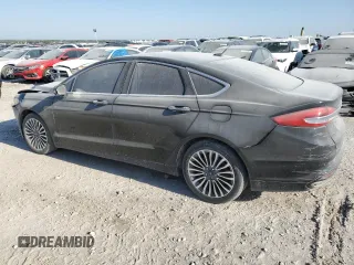 2017 Ford Fusion SE z VIN 3FA6P0H98HR179253, wystawiony jako Copart lot #52015345 z przebiegiem 99 883 mil mil oraz Czysty tytuł • Clean title. Historia ofert i sprzedaży dostępna na DreamBid. Obrazek 2.
