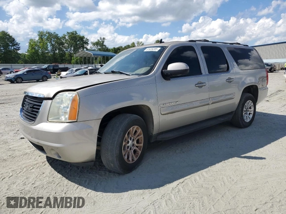 2007 GMC Yukon XL SLT z VIN 1GKFC16037R181233, wystawiony jako Copart lot #61639285 z przebiegiem 152 408 mil mil oraz Czysty tytuł • Clean title. Historia ofert i sprzedaży dostępna na DreamBid. Obrazek 1.