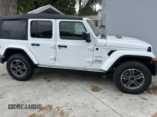 2023 Jeep Wrangler Sahara with VIN 1C4HJXENXPW586579, listed as a IAAI auction lot 41795621 with 34,433 mi miles. Bid and sale history available at carsss.com. Image 13.