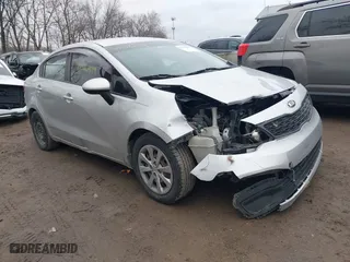 2015 Kia Rio LX with VIN KNADM4A39F6452036, listed as a IAAI auction lot 41516879 with 95,775 mi miles. Bid and sale history available at carsss.com. Image 1.