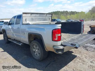 2015 GMC Sierra 1500 SLE with VIN 1GTV2UECXFZ153161, listed as a IAAI auction lot 41833071 with 148,234 mi miles. Bid and sale history available at carsss.com. Image 3.