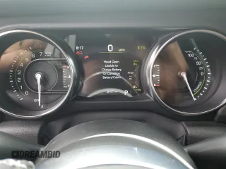2023 Jeep Wrangler Sahara z VIN 1C4JJXP62PW553101, wystawiony jako Copart lot #56935165 z przebiegiem 28 157 mil mil oraz Szkoda całkowita • Salvage title. Historia ofert i sprzedaży dostępna na DreamBid. Obrazek 9.