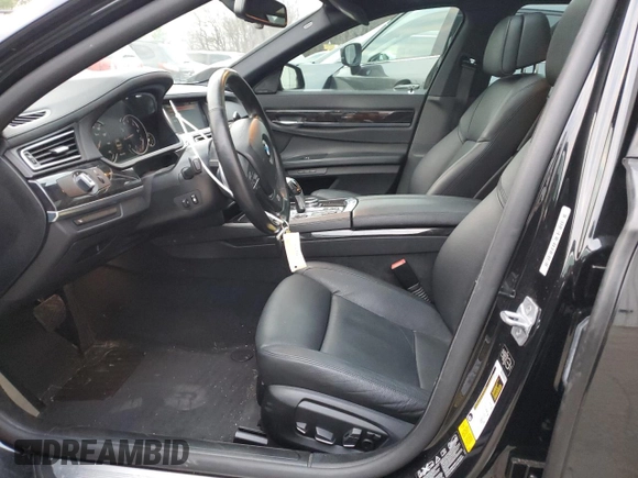 2014 BMW 7 Series 740Li xDrive with VIN WBAYF4C59ED281776, listed as a Copart auction lot 83563234 with 77,899 mi miles and Salvage Title. Bid and sale history available at carsss.com. Image 7.