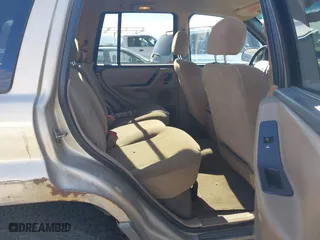 1999 Jeep Grand Cherokee Laredo with VIN 1J4GW58S4XC787702, listed as a IAAI auction lot 41663680 with 177,256 mi miles. Bid and sale history available at carsss.com. Image 8.