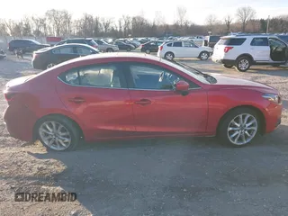 2015 Mazda 3 S Grand Touring z VIN JM1BM1W36F1244730, wystawiony jako IAAI lot #41722861 z przebiegiem 123 731 mil mil oraz . Historia ofert i sprzedaży dostępna na DreamBid. Obrazek 13.