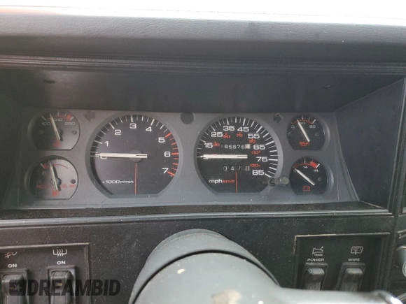 1988 Jeep Grand Cherokee z VIN 1JCMT7895JT247338, wystawiony jako Copart lot #83615234 z przebiegiem 185 676 mil mil oraz Szkoda całkowita • Salvage title. Historia ofert i sprzedaży dostępna na DreamBid. Obrazek 9.