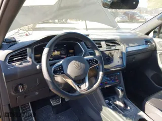 2022 Volkswagen Tiguan SE R-Line Black with VIN 3VVCB7AX1NM084993, listed as a IAAI auction lot 41502738 with 56,559 mi miles. Bid and sale history available at carsss.com. Image 18.