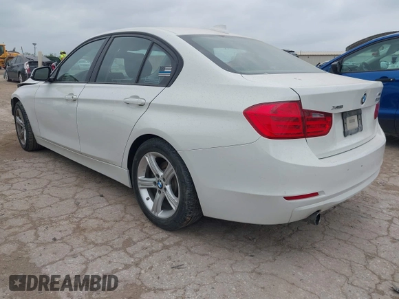 2014 BMW 3 Series 320i xDrive with VIN WBA3C3C52EP661389, listed as a IAAI auction lot 42160042 with 131,997 mi miles and . Bid and sale history available at DreamBid. Image 3.
